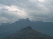 
  The mountain in the foreground depicts a Lion.