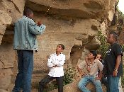 
  Listening to the Guide, from left in white: Mazhar, Asim,  Navaid and Yaseen.