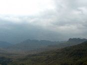 
  The mountain in the center towards the right, depicts of a Crocodile